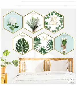 Detailed view of hexagonal Nordic wall art set featuring green plants and elegant frames