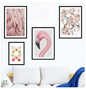 Modern wall art set with pink flamingo, butterflies, and magnolia for home decor