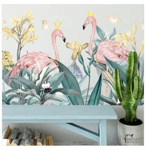 Détail de stickers muraux flamants roses avec feuilles tropicales et papillons dorés