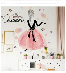 Close-up of cute cartoon girl wall sticker with pink tutu and Queen text for dorm decor