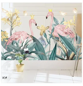 Détail de stickers muraux flamant rose et feuilles tropicales pour décor de plinthe