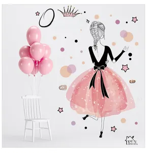 Detail of pink girl wall decal with balloons and Queen text on a clean white wall