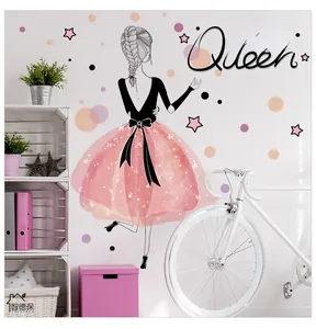 Detail of cute girl in pink dress wall decal with Queen lettering for dormitory decor