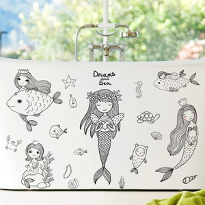Black hand-drawn mermaid wall decals applied on bathtub with Dreams about Sea text