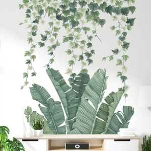 Tropical banana leaves and hanging vine wall decals for a minimalist living room decor