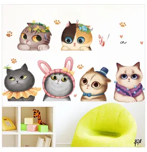 Detail view of colorful cartoon cat wall stickers featuring creative pet accessories