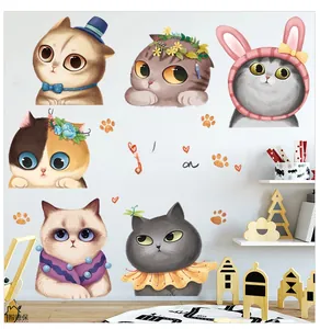 Detail of cute cartoon cat wall stickers with paw prints for nursery room decoration
