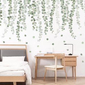 Nordic eucalyptus vine wall decals for home decor shown in a serene bedroom setting