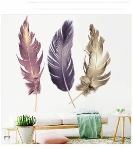 Detailed view of colorful feather wall decals in a modern living room setting