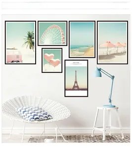 Detail view of pink Nordic wall art set featuring palm trees and Eiffel Tower posters