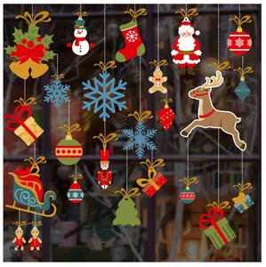 Close-up of colorful cartoon Christmas stickers featuring Santa, Reindeer and Snowflakes