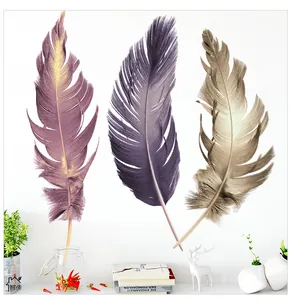 Three colorful feathers wall stickers in purple and gold for minimalist bedroom decor