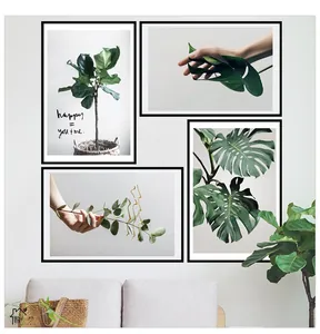 Lot de quatre cadres muraux avec plantes vertes et designs botaniques de style nordique
