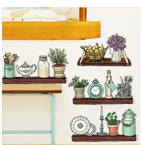 Detail van handgetekende keukenmuurstickers met potplanten en serviesgoed op een witte muur