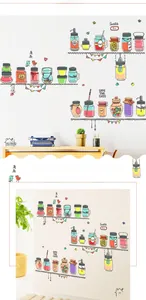 Close-up of hand-drawn cartoon wall stickers featuring colorful jam jars and fresh bottles