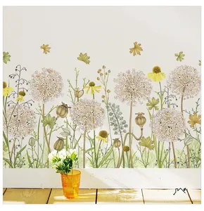 Detail of vintage floral wall stickers with dandelions on a white living room wall