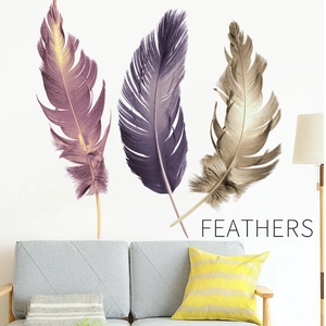 Colorful feather wall stickers set in modern living room scene with gold and purple tones