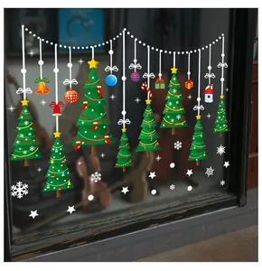 Detailed view of festive Christmas glass stickers with tree, bells and snowflakes ornaments