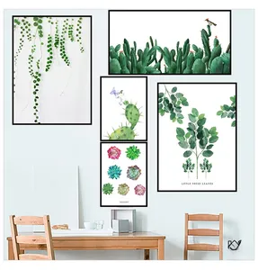 Artistic arrangement of five minimalist cactus and succulent wall art prints in black frames