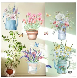 Detail of watercolor floral wall decals featuring daisies in blue kettles and pink plants