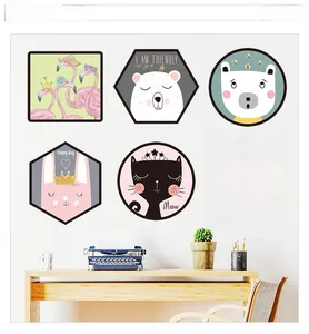 Detail of Nordic cartoon animal wall stickers featuring flamingos and foxes for nursery decor