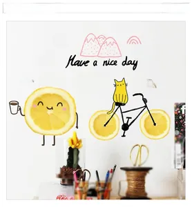 Detail of cartoon wall stickers with cat on bicycle and yellow lemon character