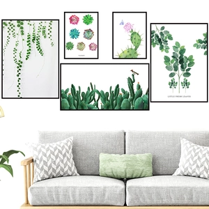 5-piece cactus and succulent wall art set with minimalist frames above a grey sofa