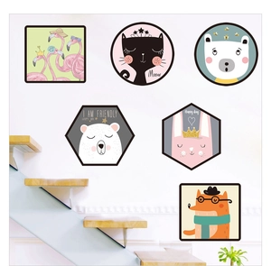 Detailed wall view of Nordic cartoon animal stickers including cats and foxes in a home setting