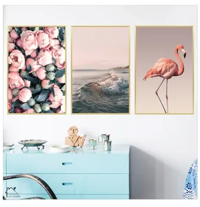 Set of 3 modern wall art pieces with pink flamingo and floral motifs in gold frames