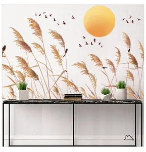 Detail of reed and bird wall stickers on living room wall above a console table