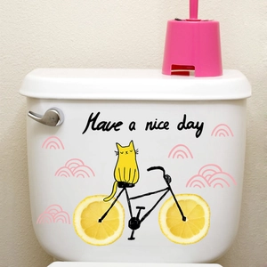 Cartoon cat on lemon bike wall sticker with Have a nice day text for home decor