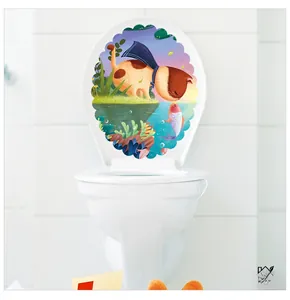 Detail of waterproof cartoon cat and fish sticker on a white bathroom toilet lid