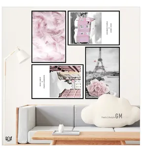 Pink Nordic landscape wall art set featuring feathers and Eiffel Tower in black frames