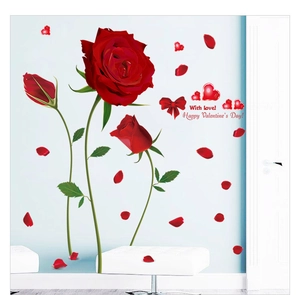 Detail of self-adhesive red rose wall stickers with Valentine's Day hearts on blue wall