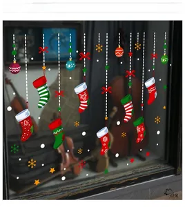 Detailed view of festive PVC window stickers with Christmas socks, snowflakes and colorful balls