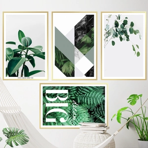 Modern Nordic tropical leaf wall art set with four botanical prints in metal frames