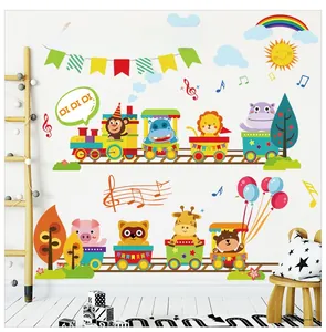 Cartoon animal train wall decal featuring a lion and giraffe for kids room nursery decor
