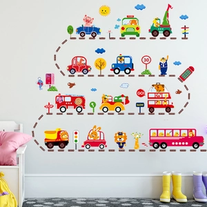 Cartoon vehicle wall decals for kids room with trucks and traffic signs on white wall