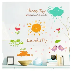 Cartoon wall stickers showing sun, birds and car on white wall for kids room