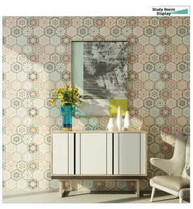 Detail of self-adhesive hexagonal wallpaper with bohemian mandala patterns in a study room