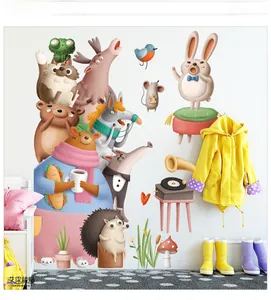 Detail of forest animal wall stickers with cartoon bear and deer for nursery decor