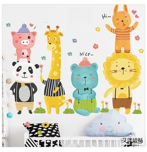 Detail showing colorful cartoon animals like pig, panda, and lion wall stickers for nursery
