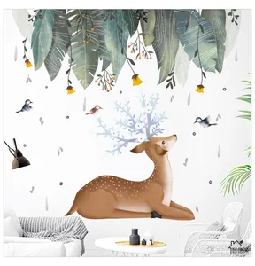 Detail of Nordic deer and leaf wall decals in a modern living room setting