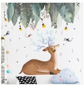 Detail of Nordic forest wall sticker featuring a deer with flower antlers and green leaves
