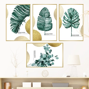 Ensemble de tableaux muraux scandinaves avec feuilles de bananier et monstera et cadres dorés