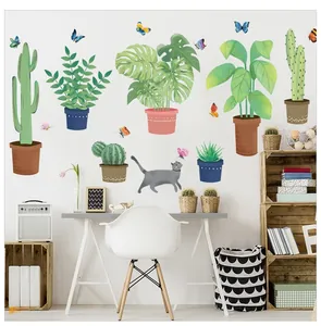 Detailed wall sticker layout featuring tropical potted plants, green leaves and a grey cat