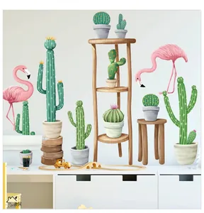 Detail of flamingo and cactus wall stickers on white wall with modern cabinet decor