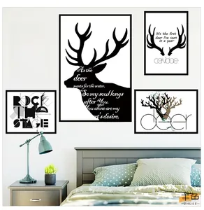 Detailed view of 5-piece modern black and white Nordic wall art set in a gray bedroom