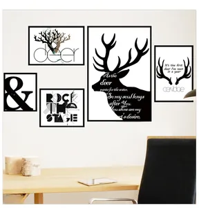 Detail of Nordic wall art set featuring black elk silhouettes and minimalist frames