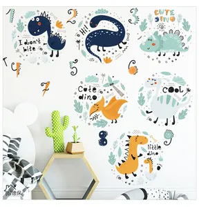 Close-up of cute cartoon dinosaurs and numbers wall stickers in a cozy nursery bedroom